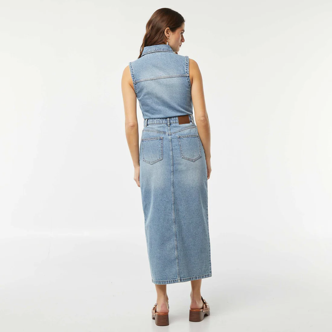Long sleeveless denim dress with multiple pockets